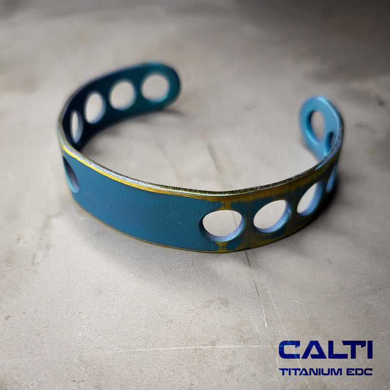 Load image into Gallery viewer, CALTI Titanium Blue Two-Tone Cuff Bracelet Hypoallergenic Anodized Design
