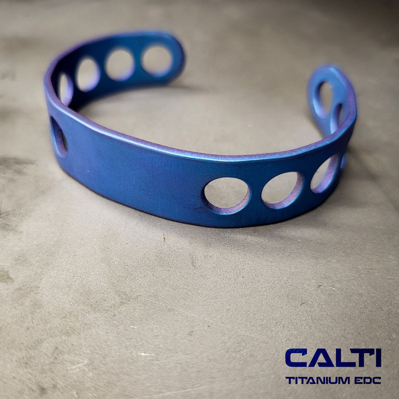 Load image into Gallery viewer, CALTI Titanium Blue Cuff Bracelet Hypoallergenic Anodized Design
