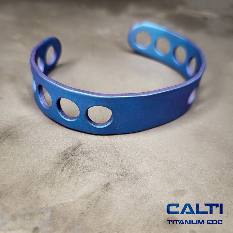 Load image into Gallery viewer, CALTI Titanium Blue Cuff Bracelet Hypoallergenic Anodized Design
