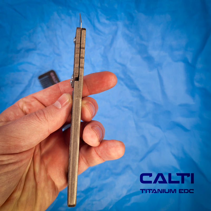 Load image into Gallery viewer, Ultimate Titanium EDC Collector’s Set – 4-Piece Tactical Gift Bundle: Utility Knife, RFID Wallet, Pocket Prybar &amp; Grooming Comb
