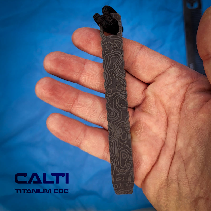 Load image into Gallery viewer, CALTI Slim Titanium Black Engraved Pocket Prybar: Ultra-Strong &amp; Lightweight EDC Tool Customized
